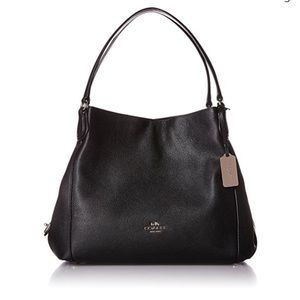 LIKE NEW Coach leather Edie bag.